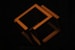 orange letter x on black background