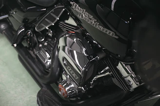 Close-up of a sleek custom Harley-Davidson engine with polished chrome details.