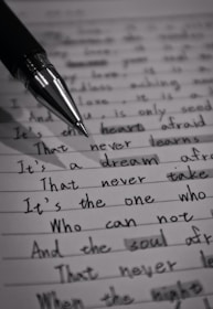 Close-up of handwritten English exercise sheets prepared by Oskar Skorupski.