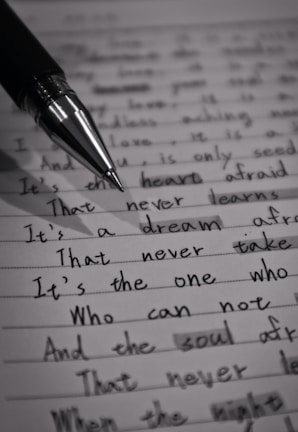 A close-up of a handwritten letter revealing personal accounts of injustice.