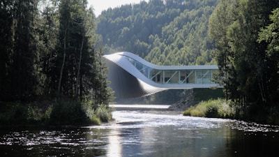 A modern infrastructure project blending seamlessly into a natural landscape.