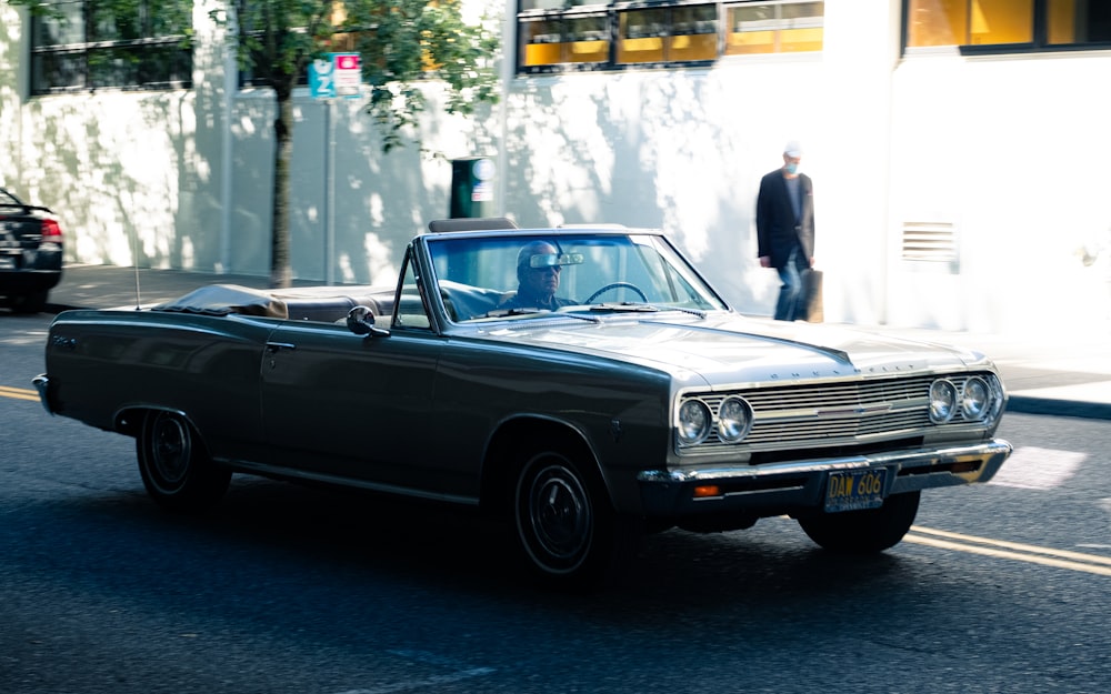 black convertible car on road during daytime