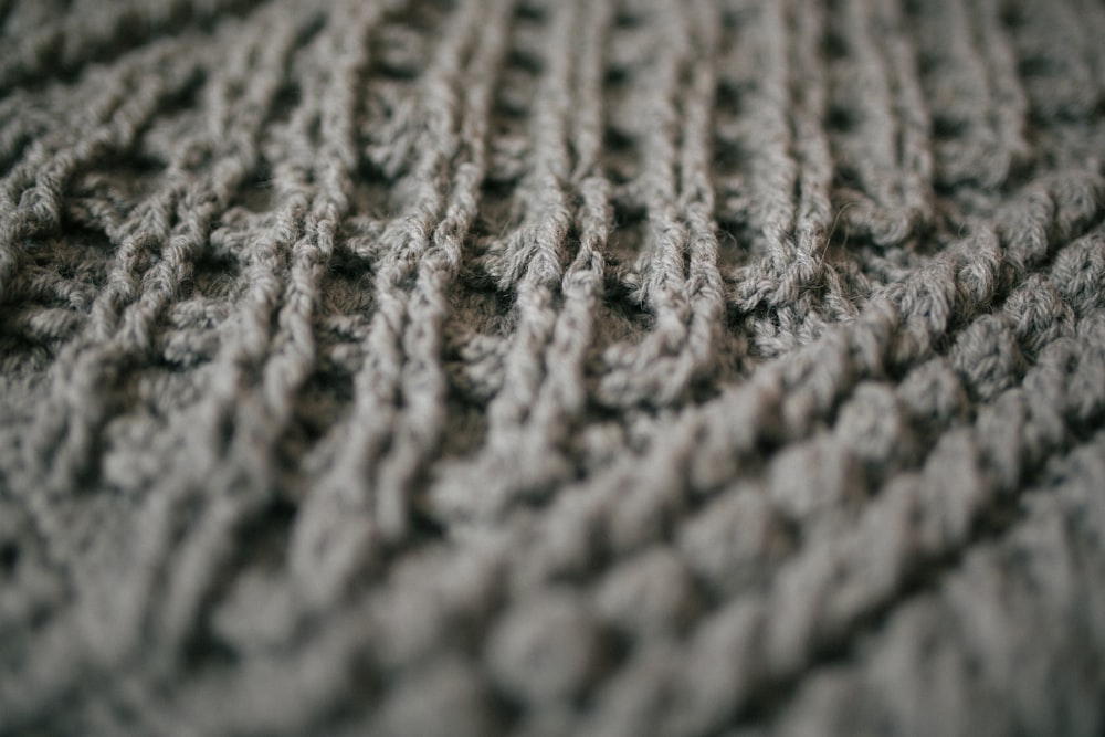 gray knit textile in close up photography