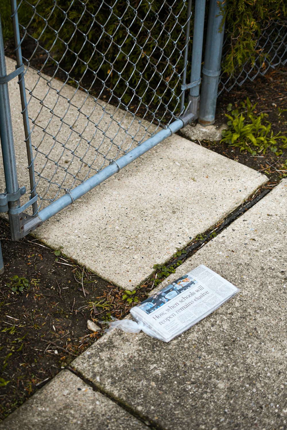 white paper on gray concrete floor