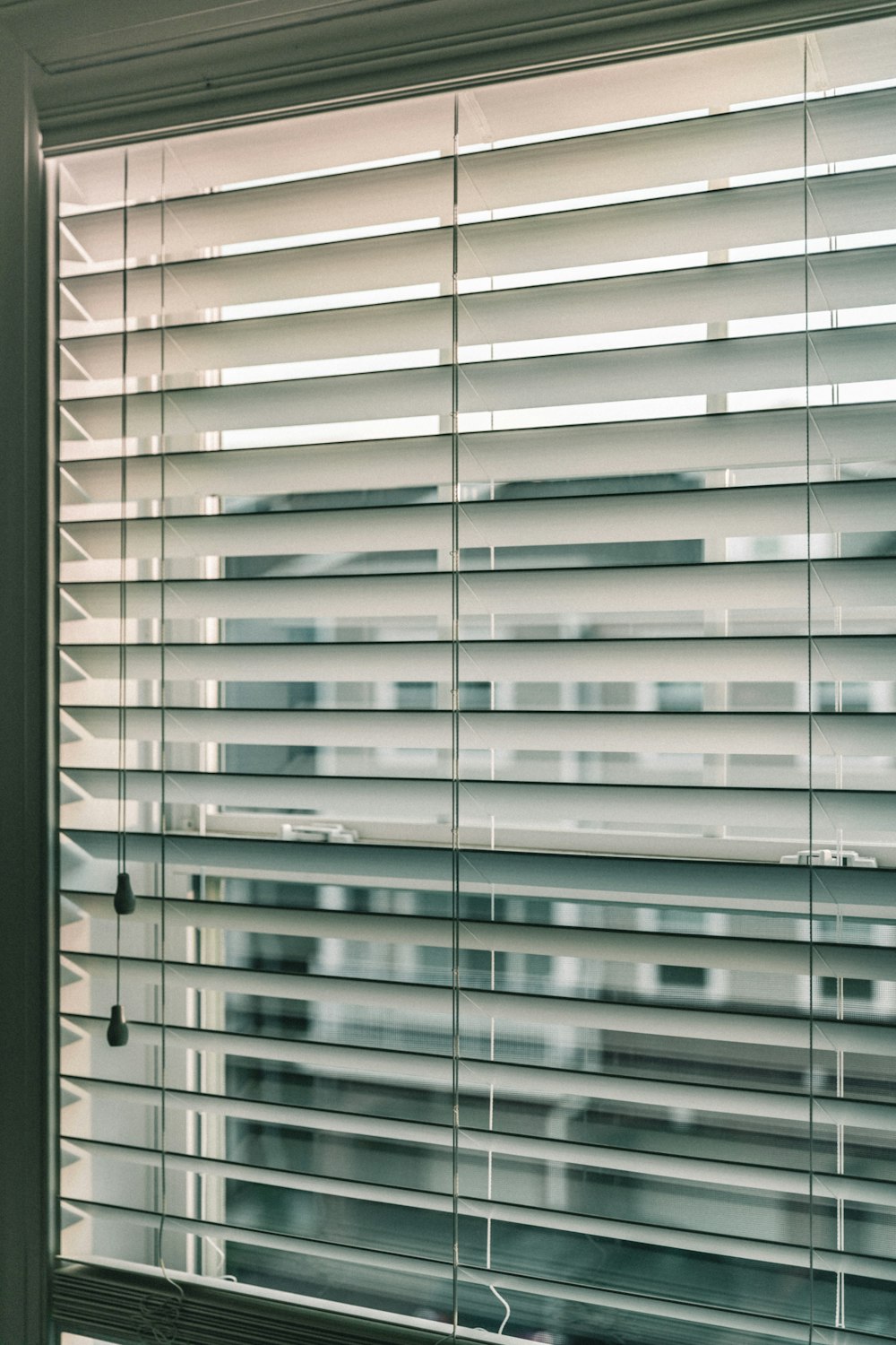 white window blinds on window