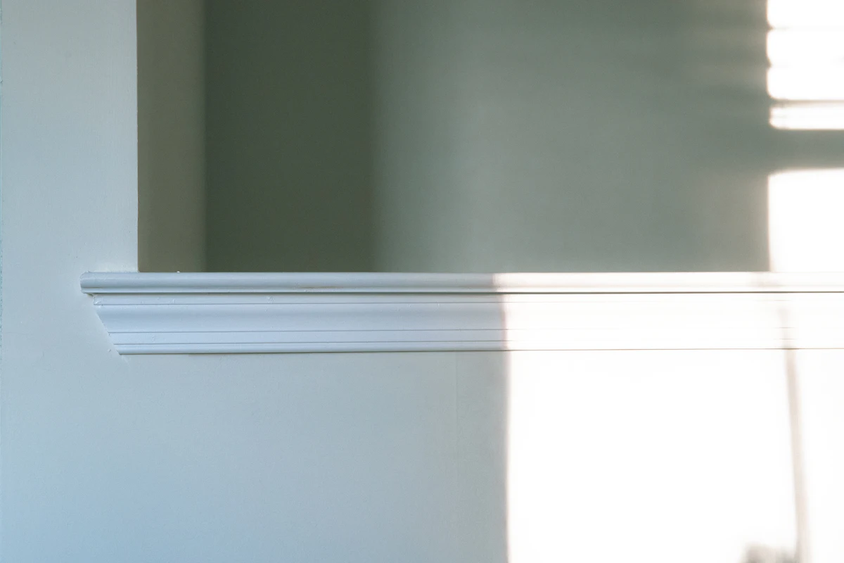 Stacked custom-ground moulding profiles including base, casing and crown