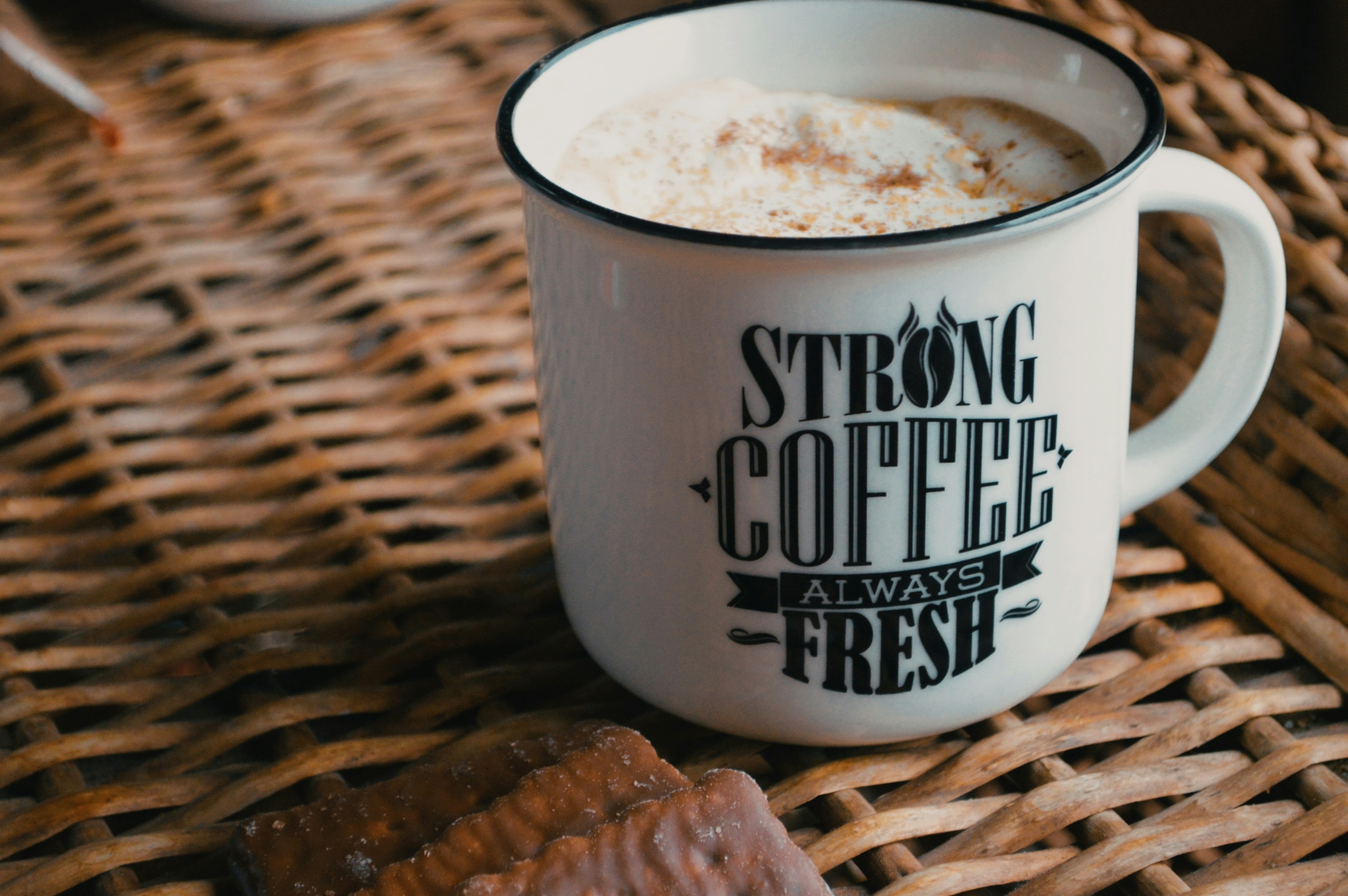 white ceramic mug with coffee