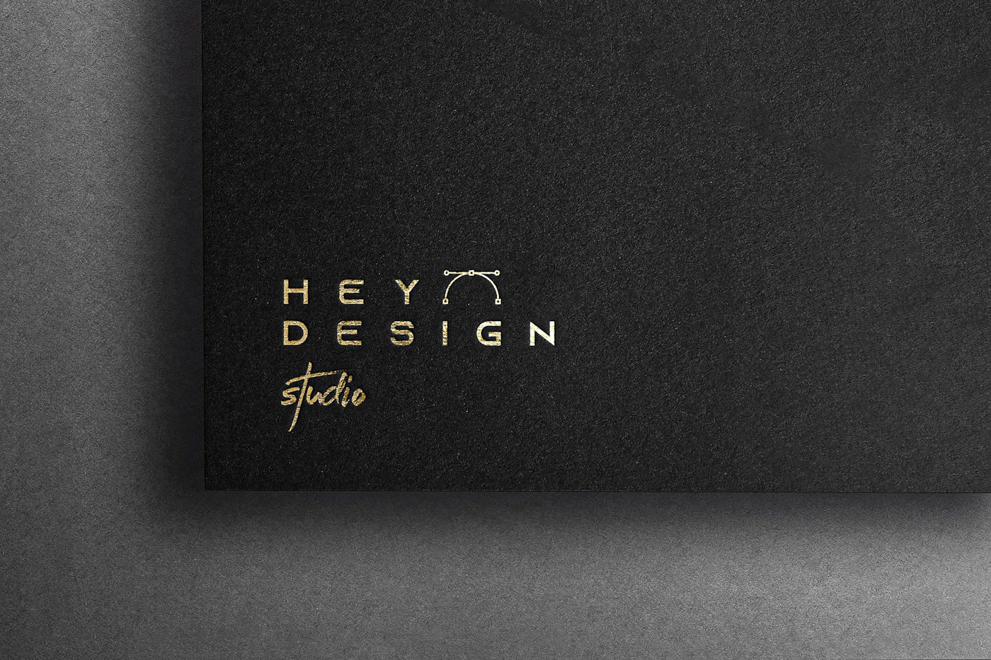Elegant gold-accented business card mockup on a neutral background