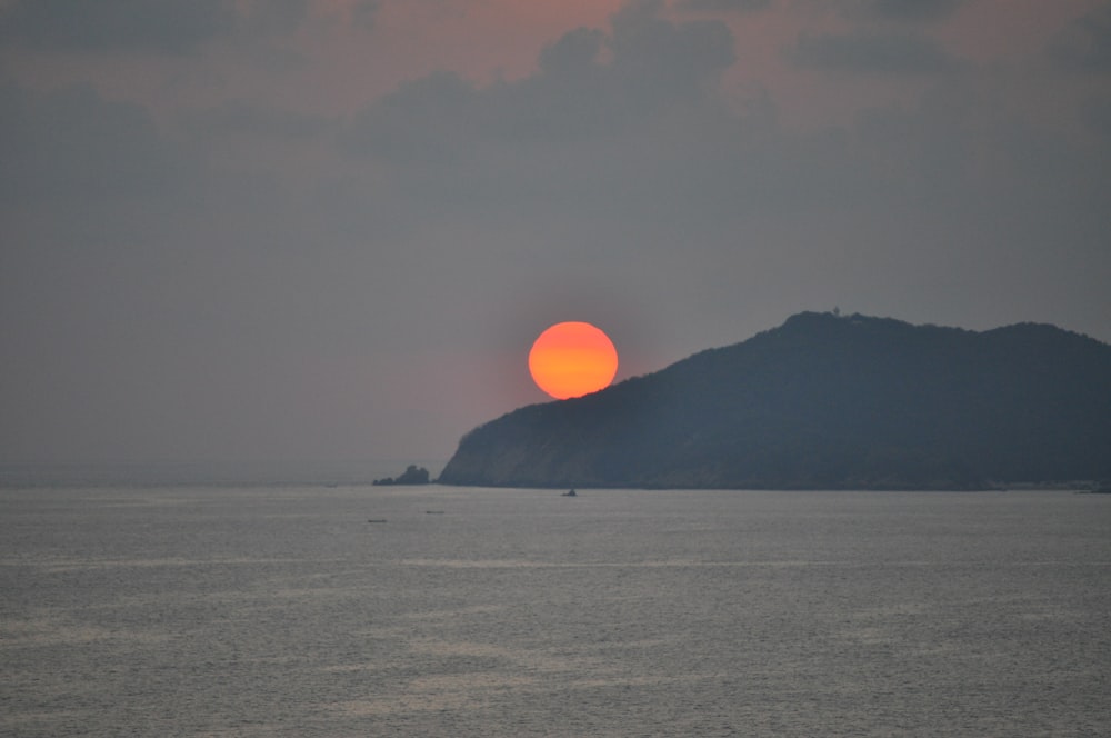 silhouette of mountain during sunset