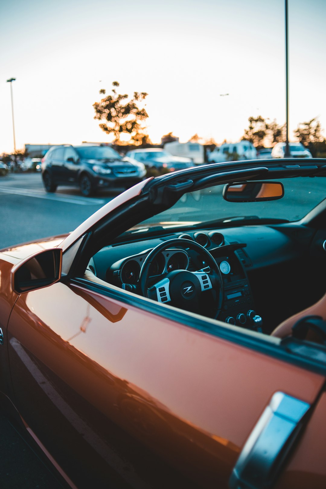 red and white car on road during daytime