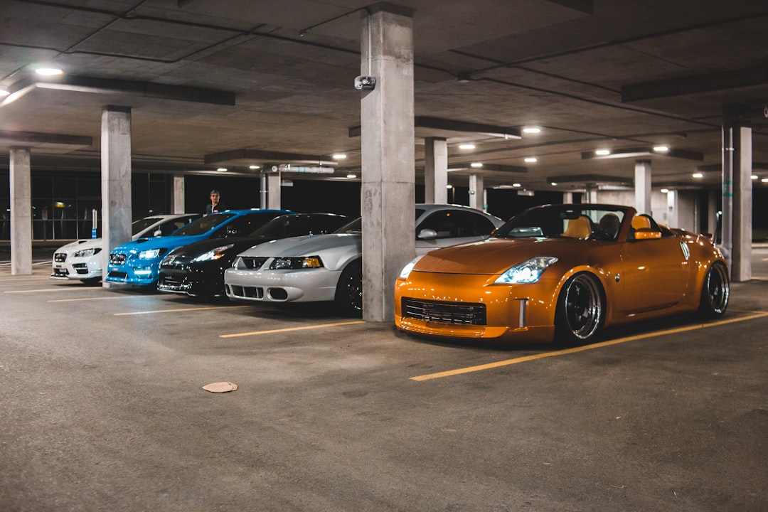 orange and blue chevrolet camaro