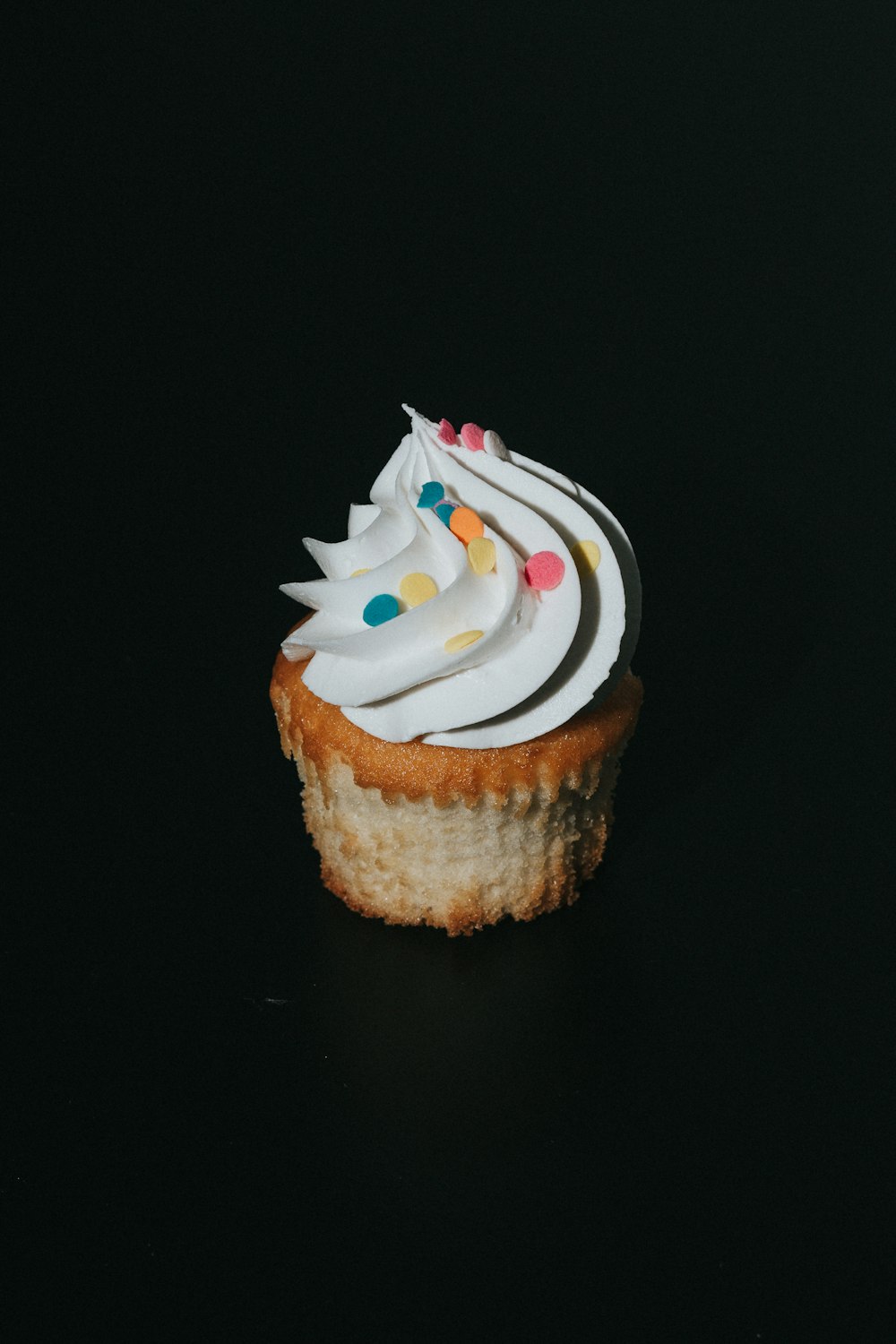 cupcake with white icing on top