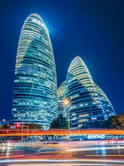 green and blue lighted building during night time