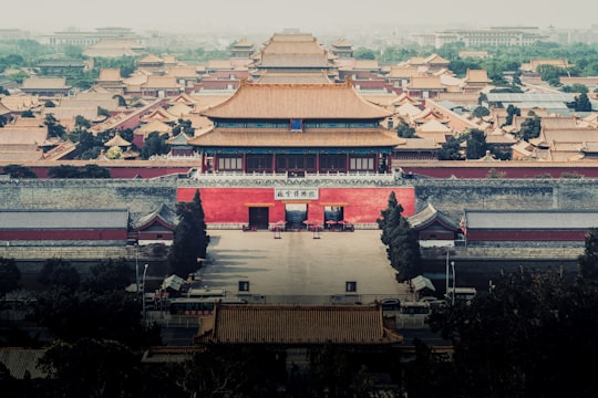 white and brown concrete building in Forbidden City China