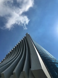 gray concrete building under blue sky during daytime