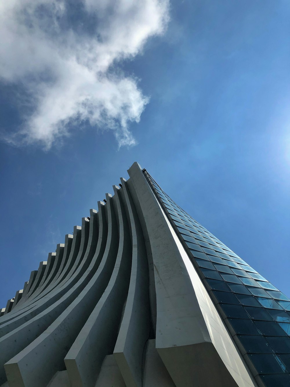 gray concrete building under blue sky during daytime