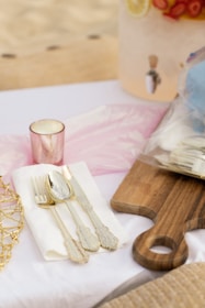 A variety of stylish cutlery sets displayed on a table.