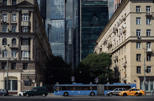 Kazrep team coordinating operations in a vibrant Kazakh cityscape.