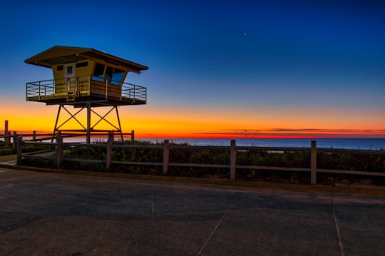 brown wooden house near sea during sunset in North Cronulla Beach Australia