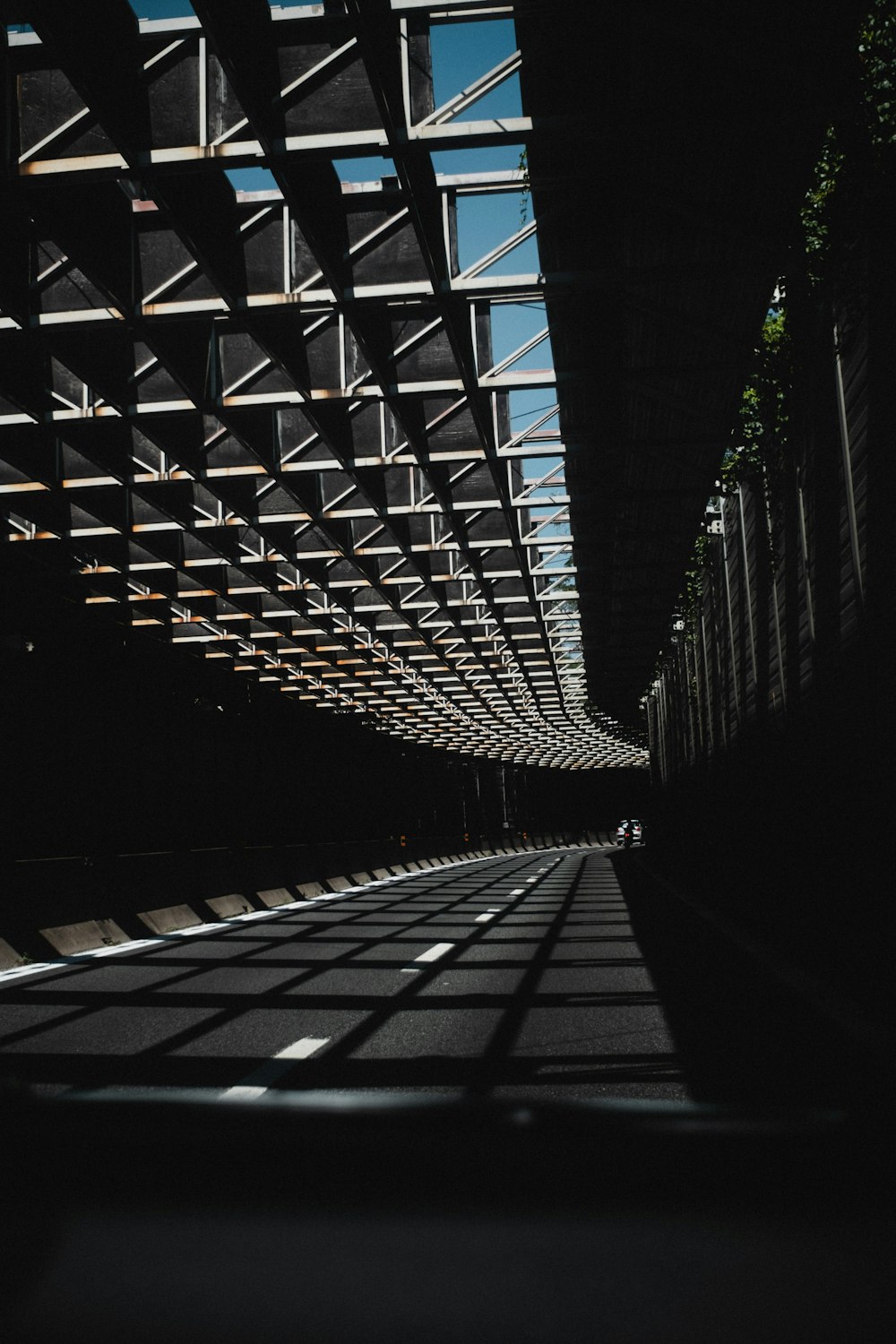 black metal bridge during night time