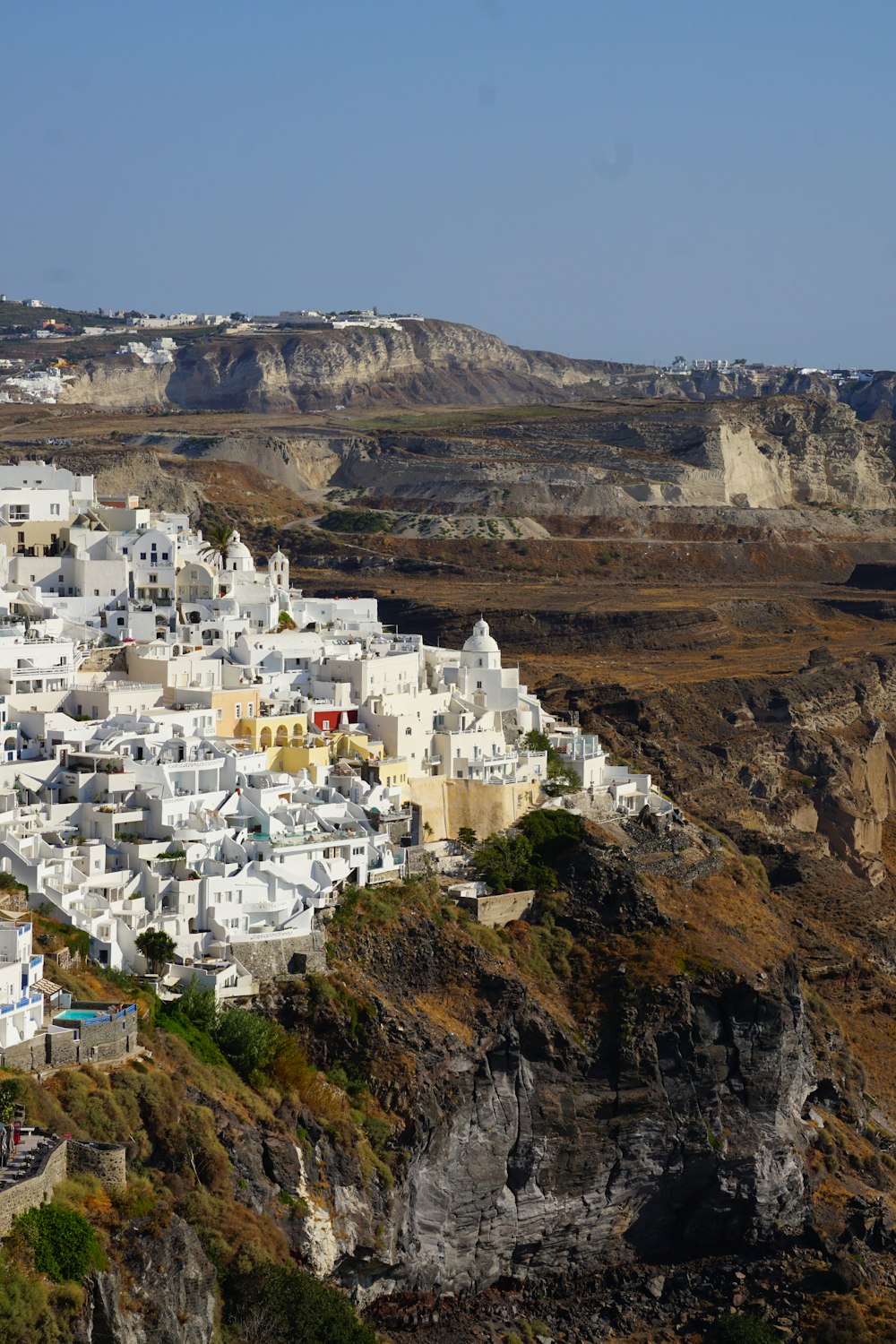 white concrete houses on mountain