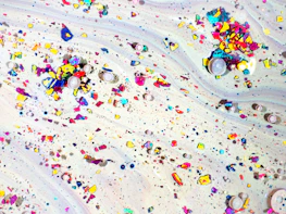 Visual of the particle network animation flowing across the landing page background.