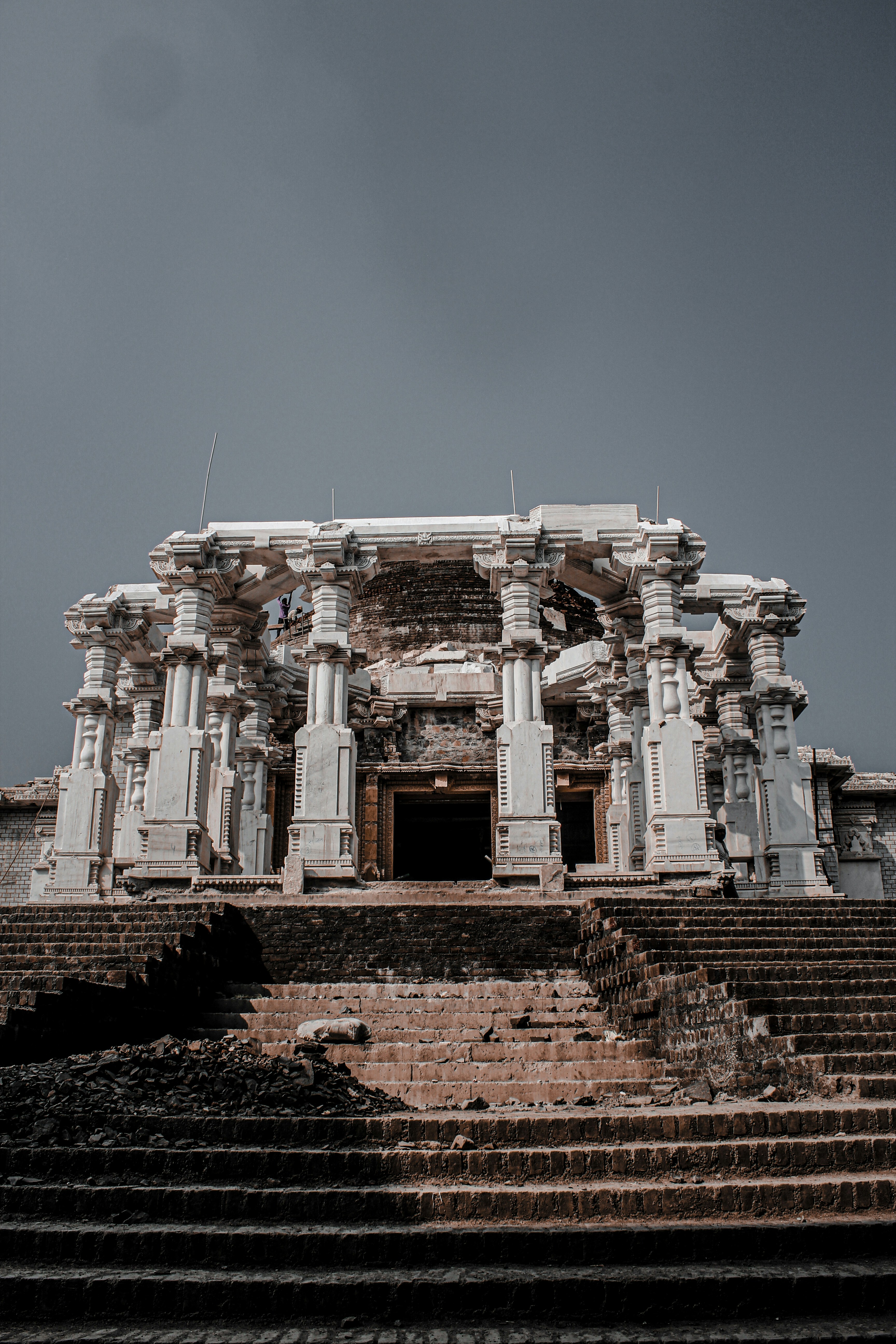 white concrete building under blue sky during daytime
