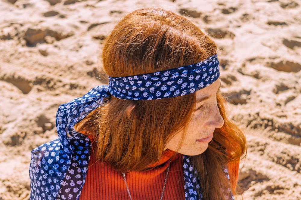 woman in blue and white floral shirt