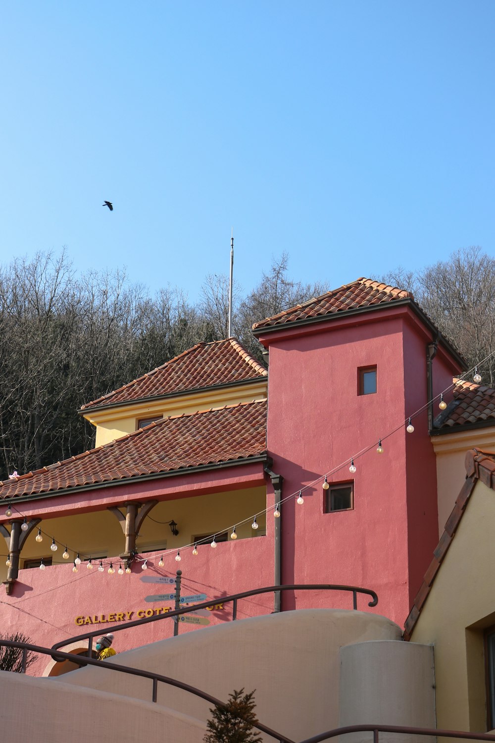 red and yellow concrete house