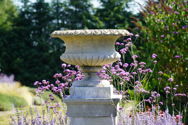 Classic rectangular cedar urn resting atop a velvet cloth that enhances its rich grain details
