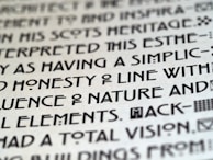 Close-up of geometric typography with technical precision and subtle glowing effects