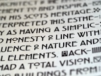 Close-up of a clean Montserrat font on a turquoise-green website interface.