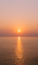 sun setting over the sea