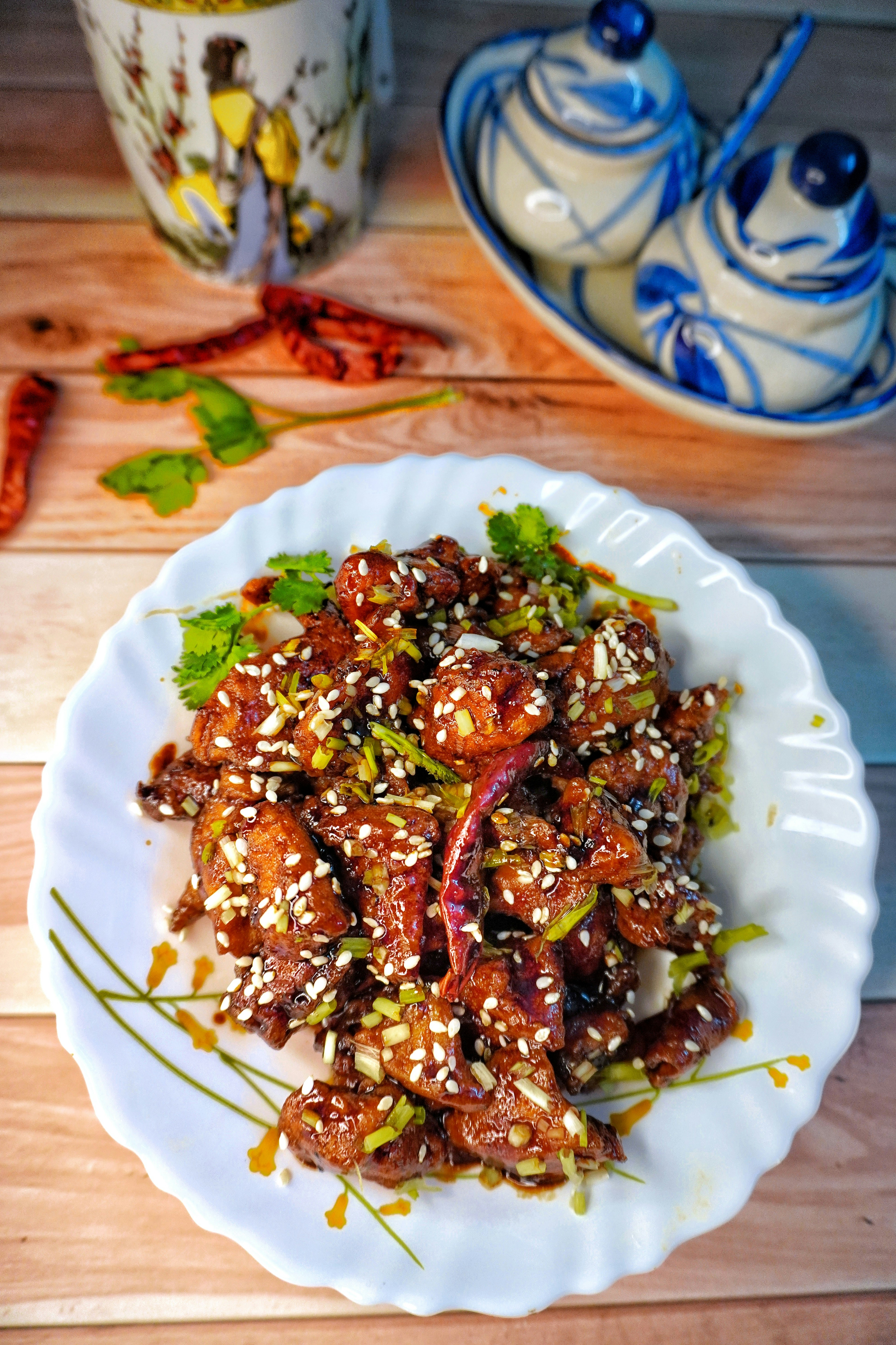 Курица генерала Цо — authentic Chinese dish, professionally plated, dark moody background, commercial food photography