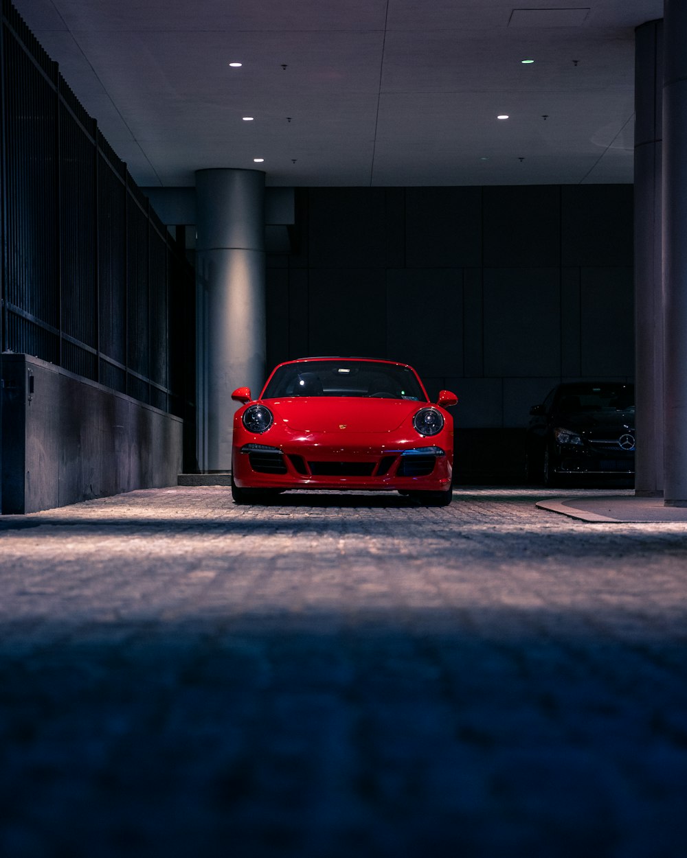 red car parked on parking lot