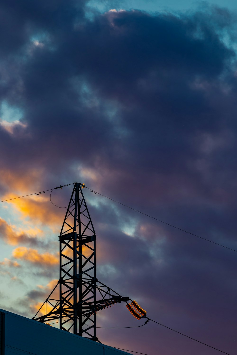 black metal tower under blue sky