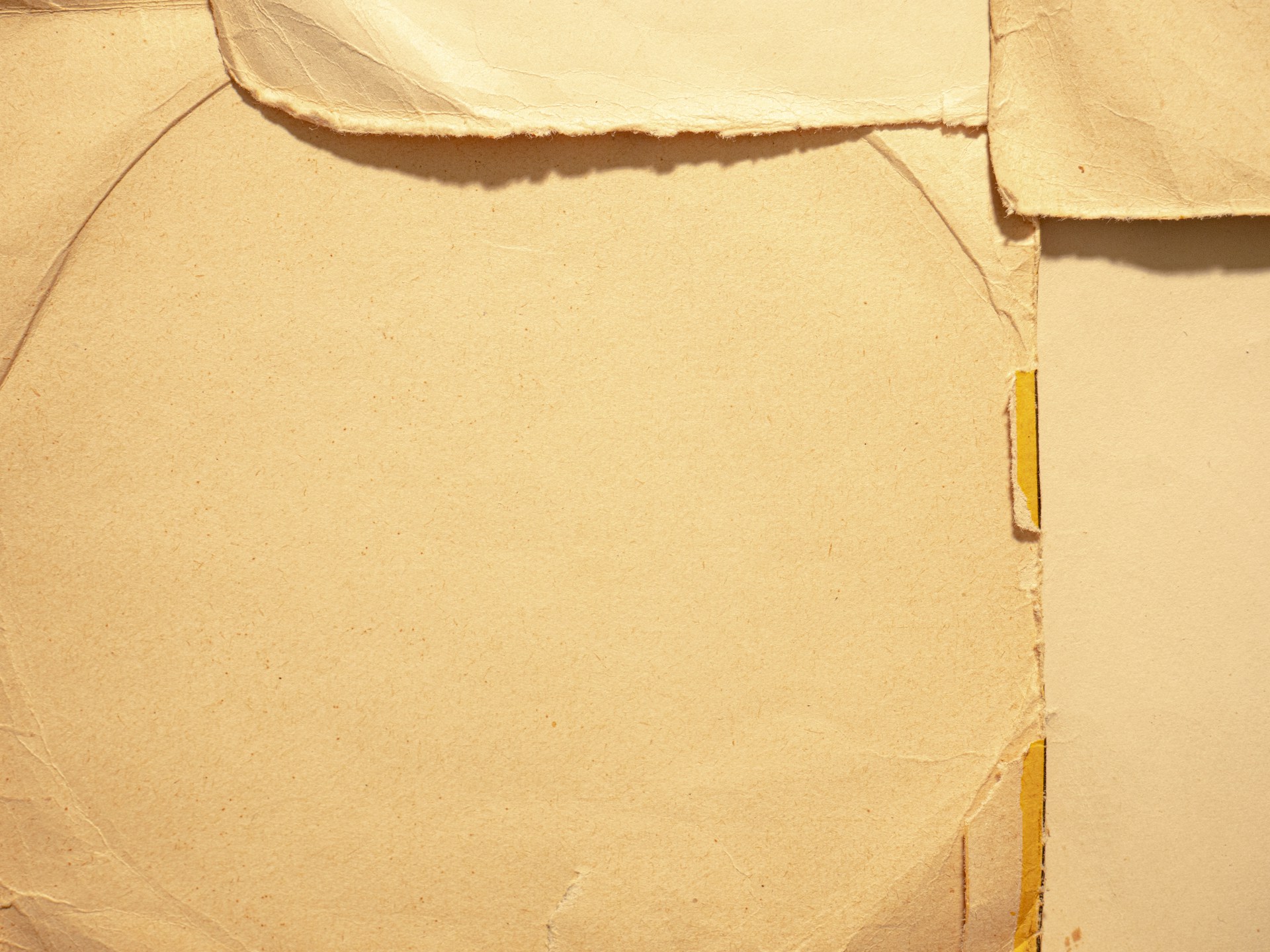 white textile on brown cardboard box