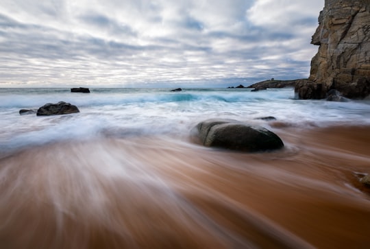 ocean waves crashing on shore during daytime in Quiberon France