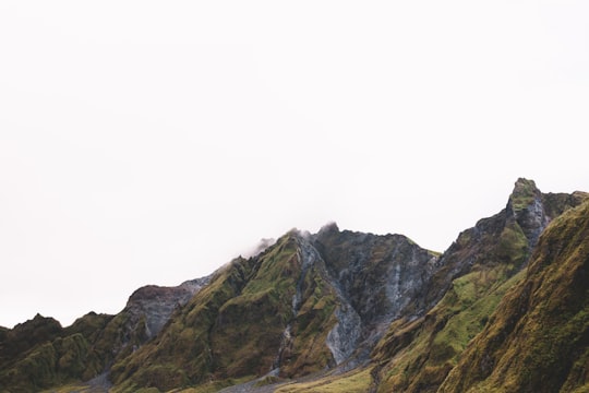 gray rocky mountain under white sky during daytime in Mt Pinatubo Philippines