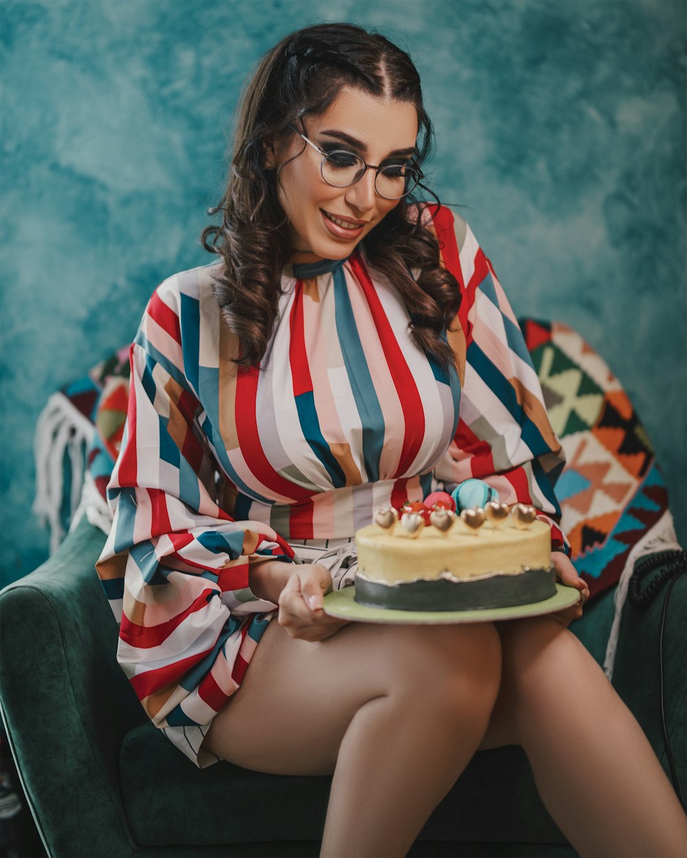 woman in red white and blue stripe long sleeve shirt holding tray with food