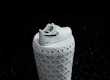 Limited edition vantus sneakers displayed on a pedestal with spotlight highlighting unique patterns