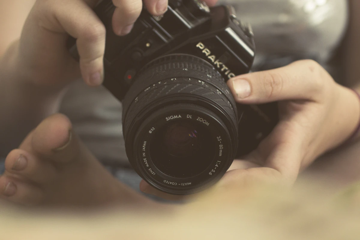Photographer holding a camera