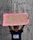 A child stands holding a handwritten cardboard sign with the message 'I need my dad. It's time 4 change.' The child is wearing a T-shirt with the words 'Black Lives Matter' against a backdrop of wooden boards.