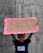 A child stands holding a handwritten cardboard sign with the message 'I need my dad. It's time 4 change.' The child is wearing a T-shirt with the words 'Black Lives Matter' against a backdrop of wooden boards.