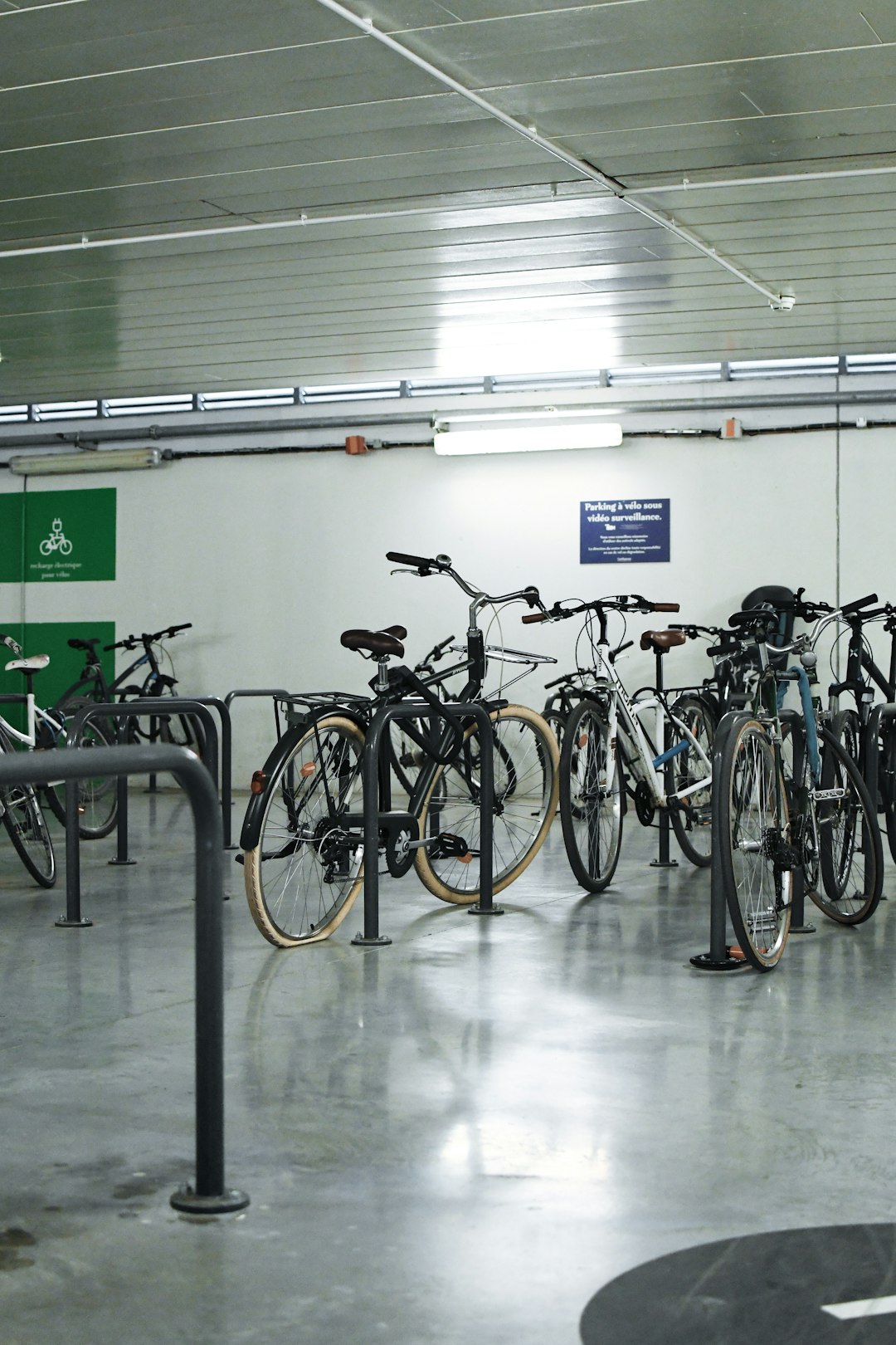 black and gray bicycle on a white floor