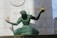 green statue of a man