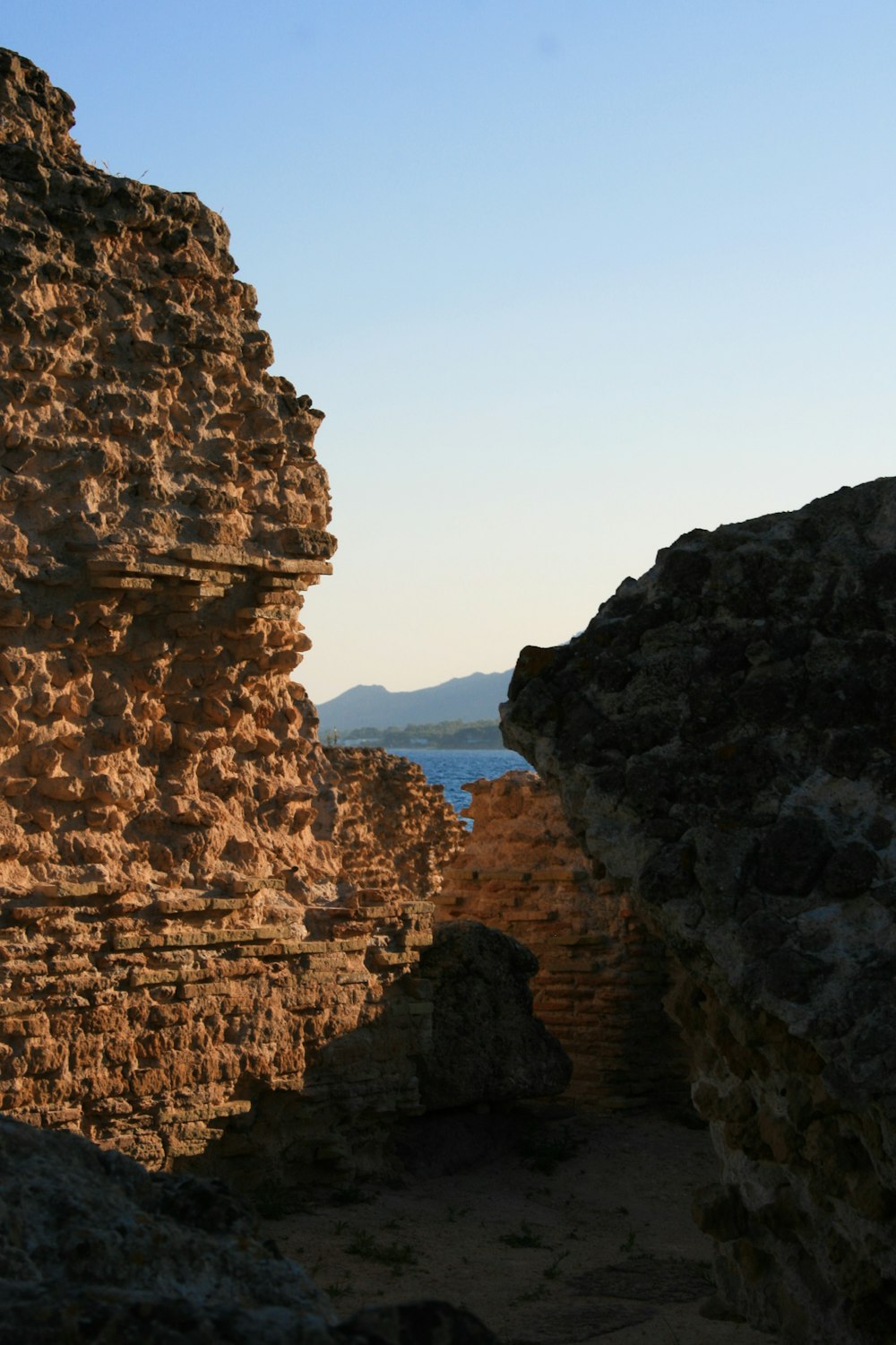 brown rock formation under blue sky during daytime