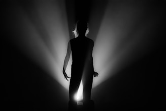 An illustration of a person surrounded by colorful aura.