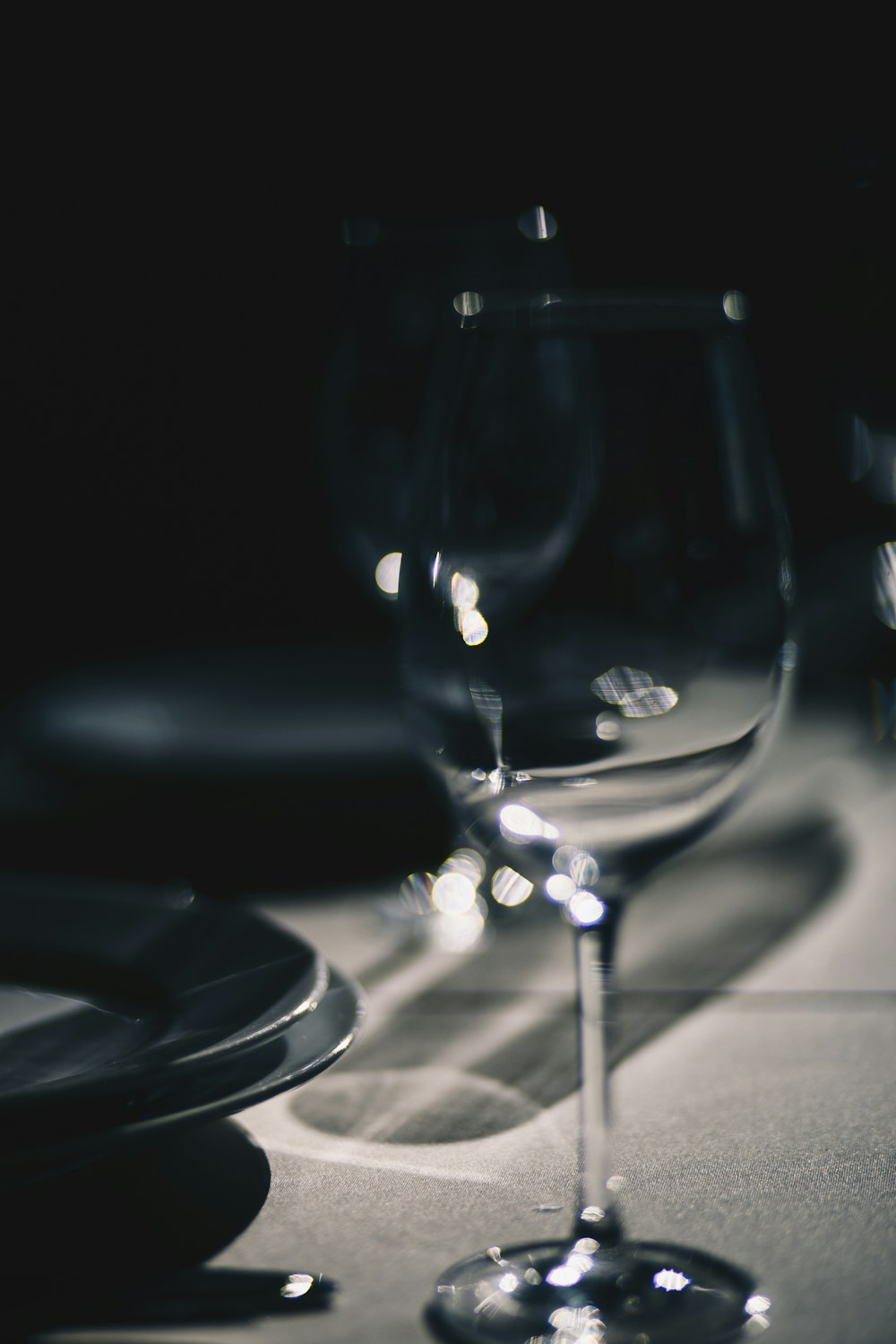 clear wine glass on black table