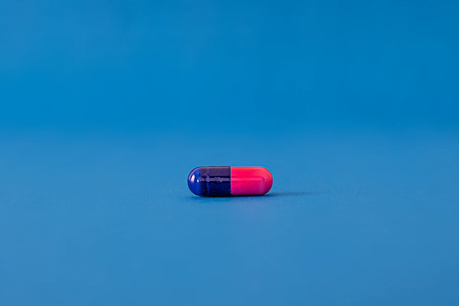 Pharmaceutical capsules on a blue surface